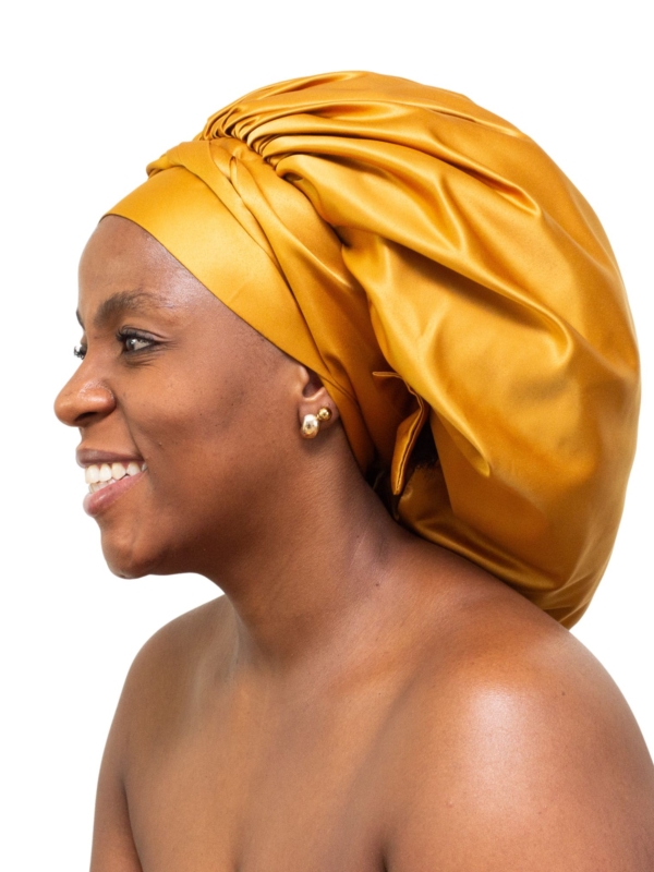 The Soleil bonnet in rich mustard satin.