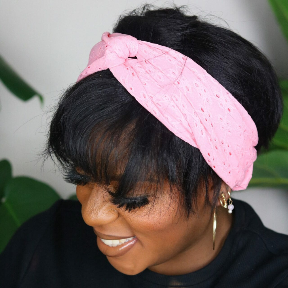 Pink fabric headband by Ndini Hair styled as part of the brand’s zero waste accessories collection.